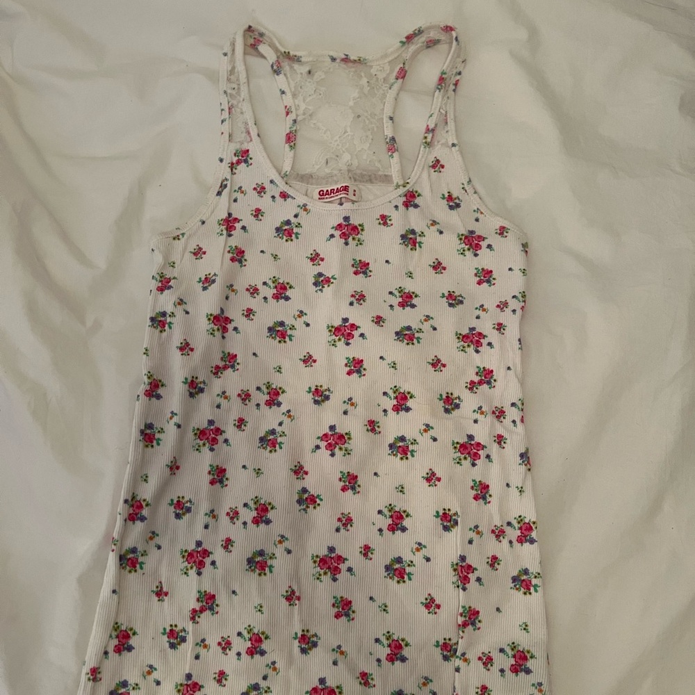 buy 1 get 1 50% off. White floral tank